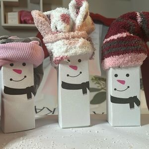 Mary Kay Energizing Foot & Leg Lotion and warm fuzzy socks. Packaged as snowman.